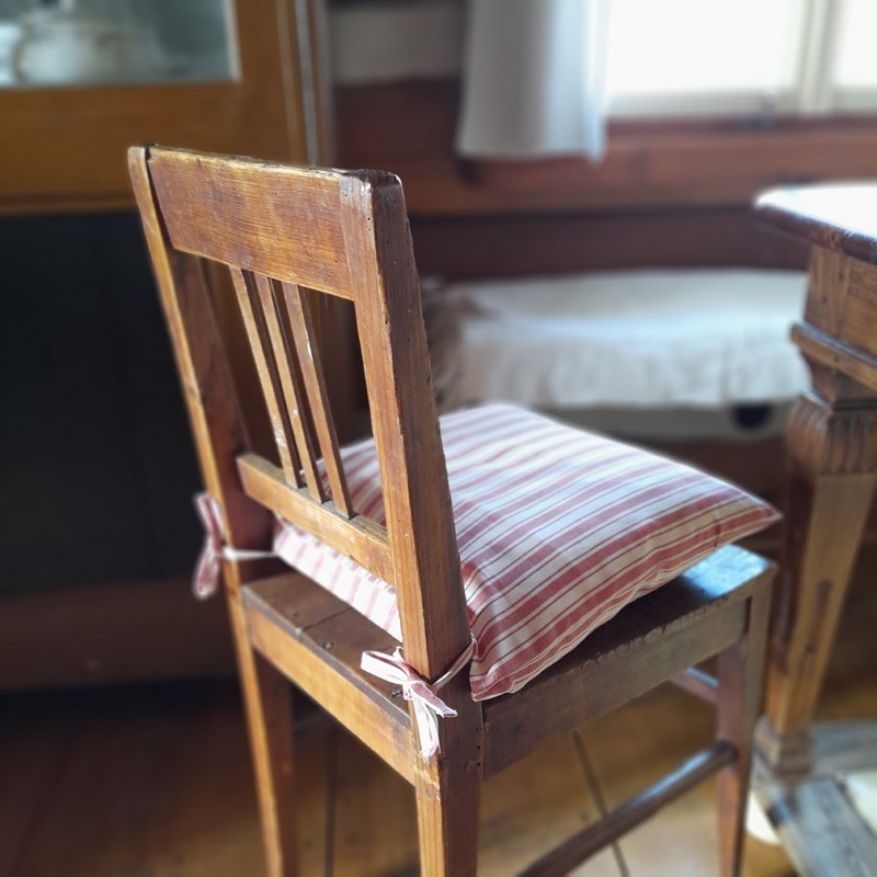 Potah na sedák - sv. červený (pruhy velké)