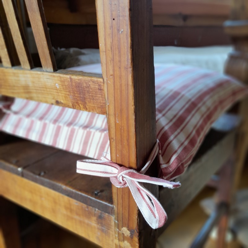 Potah na sedák - sv. červený (pruhy velké)